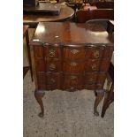 20TH CENTURY REPRODUCTION MAHOGANY SERPENTINE FRONT THREE DRAWER CHEST RAISED ON CABRIOLE LEGS, 61CM