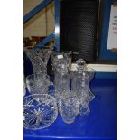 MIXED LOT: VARIOUS CUT GLASS WARES TO INCLUDE LARGE VASES, BOWLS, TABLE BELL, SPIRIT DECANTERS ETC