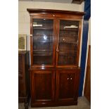 VICTORIAN MAHOGANY TWO PIECE BOOKCASE CABINET WITH MOULDED CORNICE OVER TWO GLAZED DOORS WITH