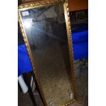 MODERN GILT FRAMED WALL MIRROR, APPROX 96 X 34CM