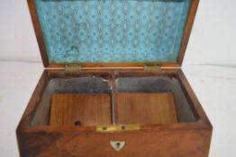 19TH CENTURY WALNUT VENEERED SARCOPHAGUS FORMED TEA CADDY SET ON BUN FEET