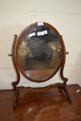 EARLY 20TH CENTURY BEVELLED GLASS OVAL SWING MIRROR, 58CM HIGH