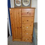 MODERN PINE TALLBOY CABINET WITH FIVE DRAWERS AND A SINGLE DOOR, 87CM X 138CM