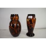 TWO AUSTRALIAN HIELCO WARE VASES DECORATED WITH KOOKABURRAS AND FLOWERS