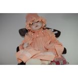 BYRON PORCELAIN HEADED DOLL SET ON SMALL DOLL'S CHAIR