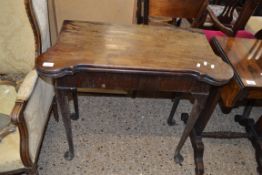 GEORGE III MAHOGANY FOLDING CARD TABLE WITH BAIZE LINED INTERIOR RAISED ON TAPERING LEGS AND PAD