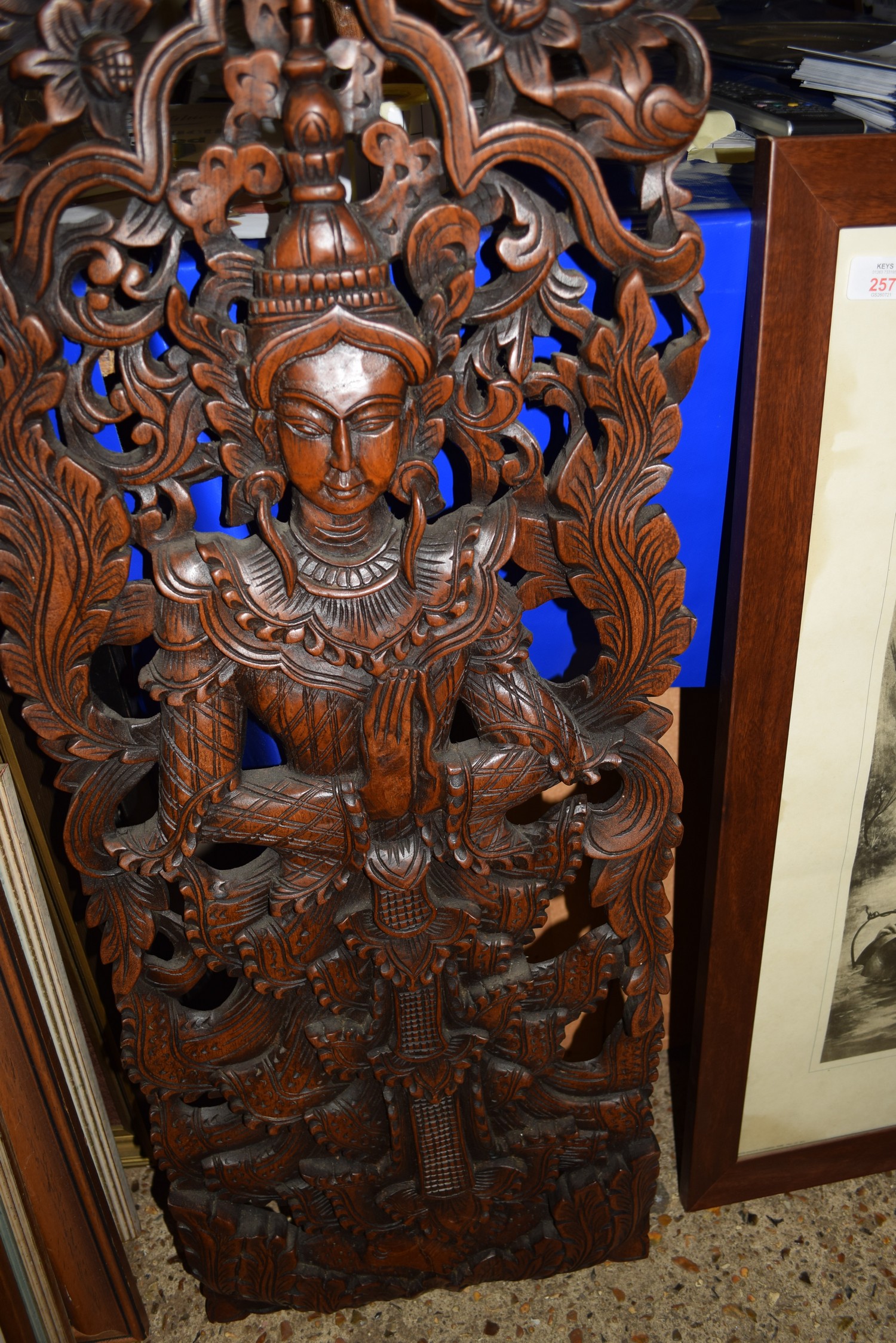 MODERN SOUTH EAST ASIAN CARVED WALL PLAQUE OF A DEITY