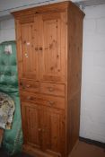 MODERN PINE FOUR DOOR THREE DRAWER CABINET