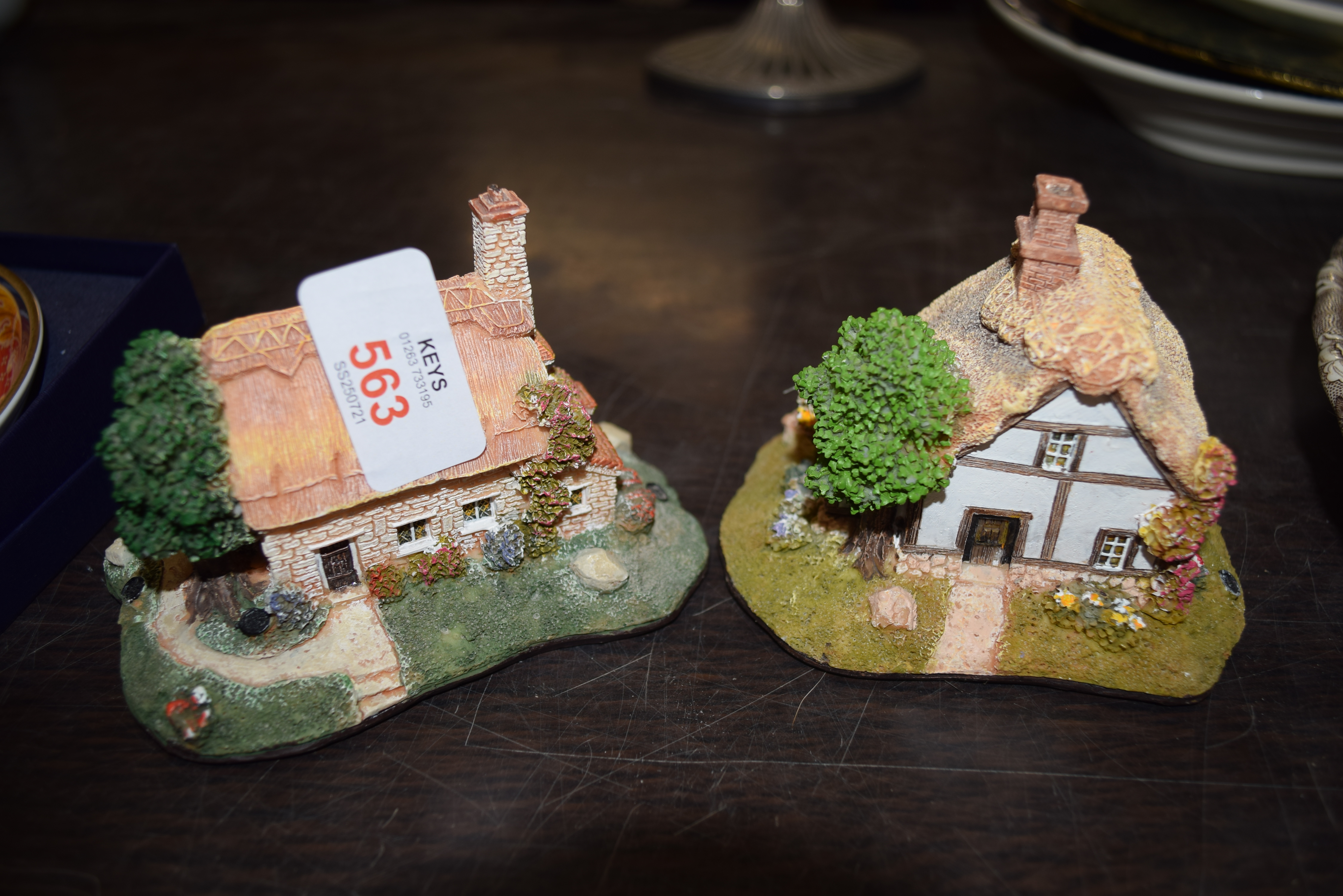 ROYAL COMMEMORATIVE BEAKER AND TWO COTTAGE MODELS