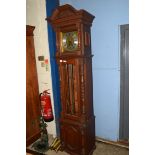 20TH CENTURY TRIPLE WEIGHT LONGCASE CLOCK IN HEAVY OAK CASE FITTED WITH A BRASS MOVEMENT STRIKING ON