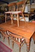 MODERN PINE KITCHEN TABLE AND FOUR SPINDLE BACK CHAIRS, 150CM WIDE