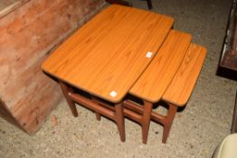 NEST OF THREE TEAK EFFECT RETRO TABLES BY SCHREIBER, LARGEST 70CM WIDE