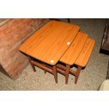 NEST OF THREE TEAK EFFECT RETRO TABLES BY SCHREIBER, LARGEST 70CM WIDE