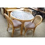 BAMBOO FRAMED CIRCULAR TABLE AND FOUR ACCOMPANYING CHAIRS, TABLE 97CM DIAM