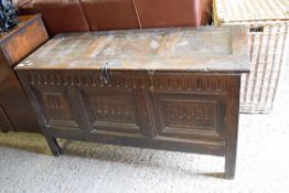 17TH CENTURY OAK COFFER WITH THREE PANELLED FRONT WITH CARVED DETAIL, OPENING TO A VOID INTERIOR,