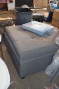 UPHOLSTERED STORAGE OTTOMAN