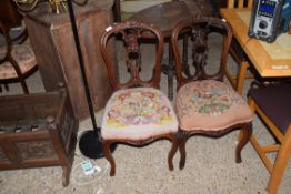 PAIR OF VICTORIAN BALLOON BACK MAHOGANY DINING CHAIRS DECORATED WITH CARVED DETAIL, UPHOLSTERED WITH