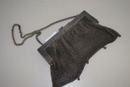 WHITE METAL OR PLATED MESHWORK EVENING BAG STAMPED TO INTERIOR "G. SILVER"