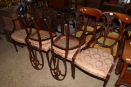 SET OF SIX 19TH CENTURY MAHOGANY DINING CHAIRS WITH OVAL PIERCED BACKS DECORATED WITH FLORAL