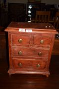 SMALL APPRENTICE CHEST OF TWO SHORT AND TWO LONG DRAWERS, 35CM WIDE