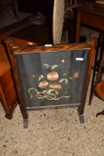 EARLY 20TH CENTURY OAK FRAMED FIRE SCREEN WITH NEEDLEWORK FLORAL CENTRE, 52CM WIDE