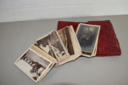 RED CASE CONTAINING VARIOUS VINTAGE POSTCARDS