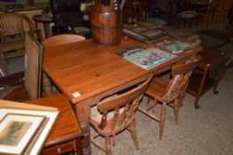 MODERN PINE KITCHEN TABLE AND FOUR SPINDLE BACK CHAIRS, 150CM WIDE