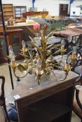 20TH CENTURY GILT METAL EIGHT-LIGHT CENTRE CEILING LIGHT FITTING DECORATED WITH FLOWERS AND FOLIAGE,