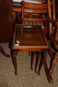 NEST OF THREE MAHOGANY GLASS TOP OCCASIONAL TABLES, LARGEST 51CM WIDE