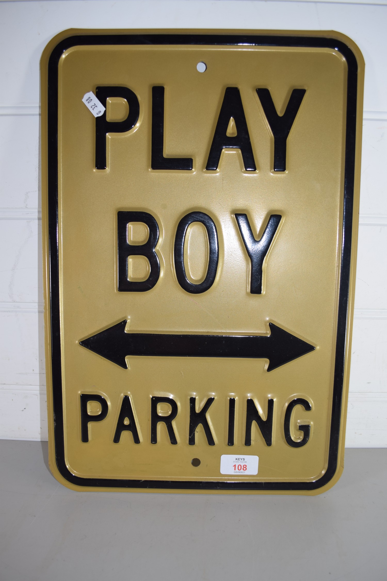 MODERN METAL SIGN MARKED "PLAYBOY PARKING"