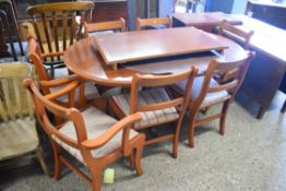 YEW WOOD TWIN PEDESTAL EXTENDING DINING TABLE AND SIX ACCOMPANYING CHAIRS