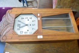 ART DECO STYLE FRENCH WALL CLOCK IN OAK CASE, 68CM WIDE