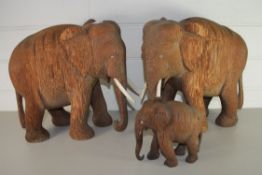 PAIR OF HARDWOOD MODEL ELEPHANTS AND A BABY ELEPHANT (3)