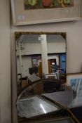 OVAL BEVELLED WALL MIRROR WITH METAL RIBBON MOUNT TOGETHER WITH A FURTHER LARGER RECTANGULAR WALL