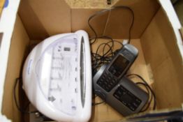 BT PORTABLE TELEPHONE AND A BATTERY CHARGER