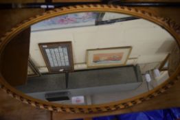 OVAL WALL MIRROR IN GILT DECORATED FRAME, 75CM HIGH