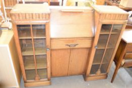 EARLY 20TH CENTURY OAK COMBINATION BUREAU BOOKCASE WITH GLAZED SIDE SECTIONS, 122CM WIDE