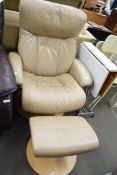 BEIGE LEATHER REVOLVING CHAIR AND FOOT STOOL