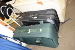 ONE BLACK AND ONE GREEN FABRIC SUITCASE