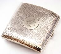 Edward VII silver cigarette case of hinged slightly curved form, decorated with planished detail and