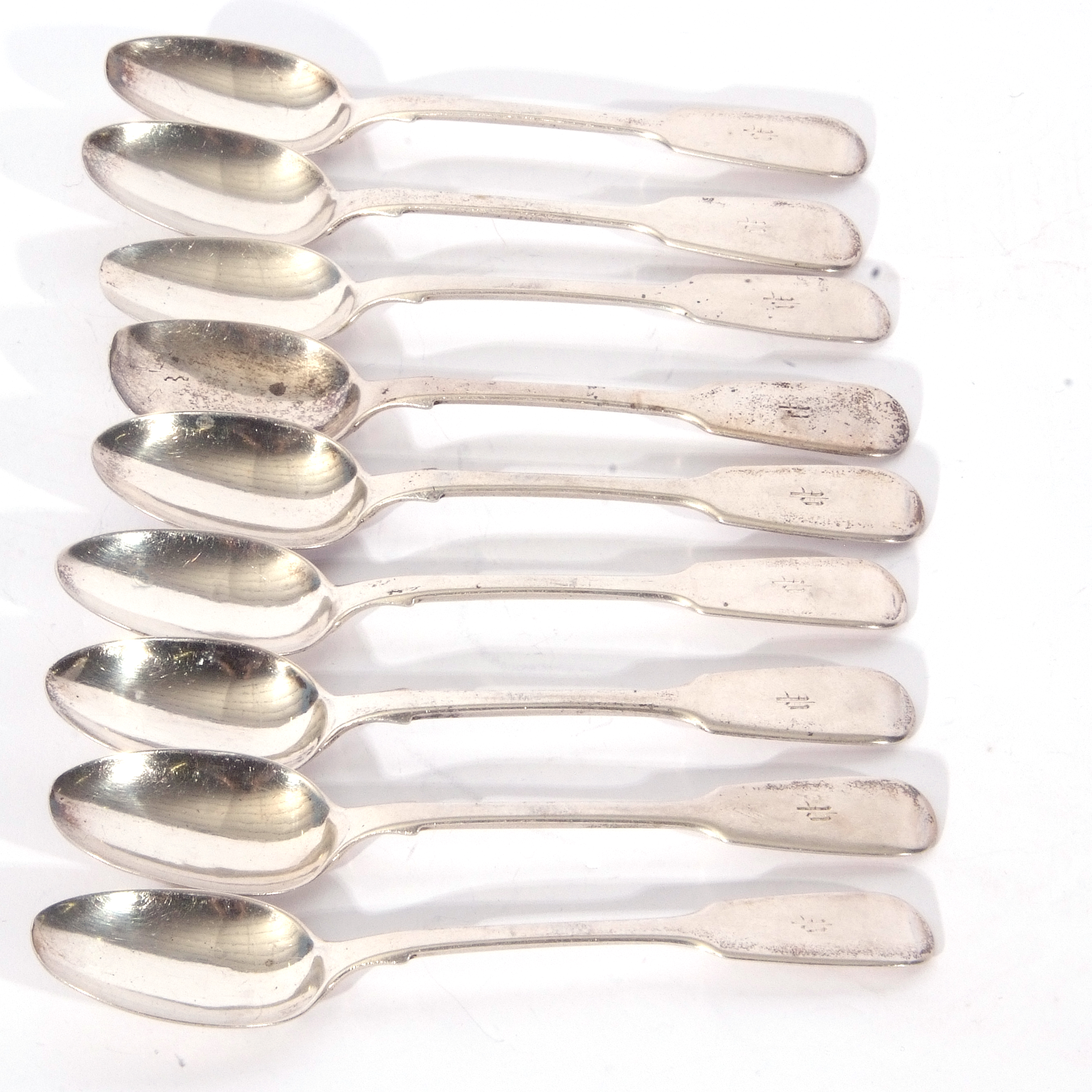 Set of nine Victorian silver Fiddle pattern tea spoons, London 1868, maker's mark SS, possibly