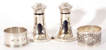 Mixed Lot: pair of George V silver pepper pots of spreading cylindrical form, maker's mark Joseph