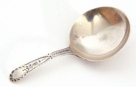 George III silver caddy spoon, the stem decorated with bright cut detail, London 1803, maker's