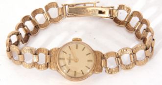 Ladies third quarter of 20th century hallmarked 9ct gold wrist watch by Tissot, having gold hands to