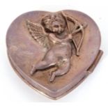 20th century white metal heart shaped small box of hinged form, decorated with Cupid to front, no