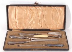 Cased silver and bone handled ladies accessory set comprising shoe horn, button hook, glove