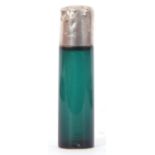19th century green glass and white metal mounted scent bottle of cylindrical form, fitted with screw