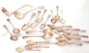 Collection of silver flatwares to include a George III silver sauce ladle, London hallmarks, a