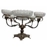 Regency style large silver plated table centrepiece, the base of waisted square form and supported