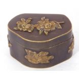 Chinese antimony box of hinged form, decorated with applied detail of various symbols and flowers,